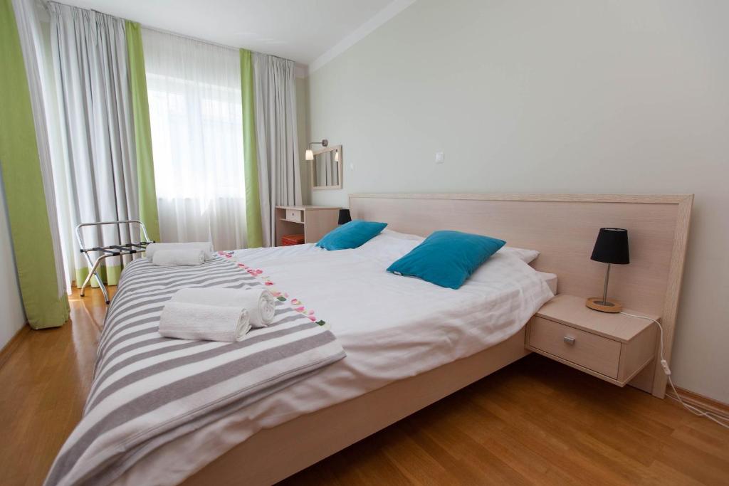 Posteľ alebo postele v izbe v ubytovaní Apartments Ines