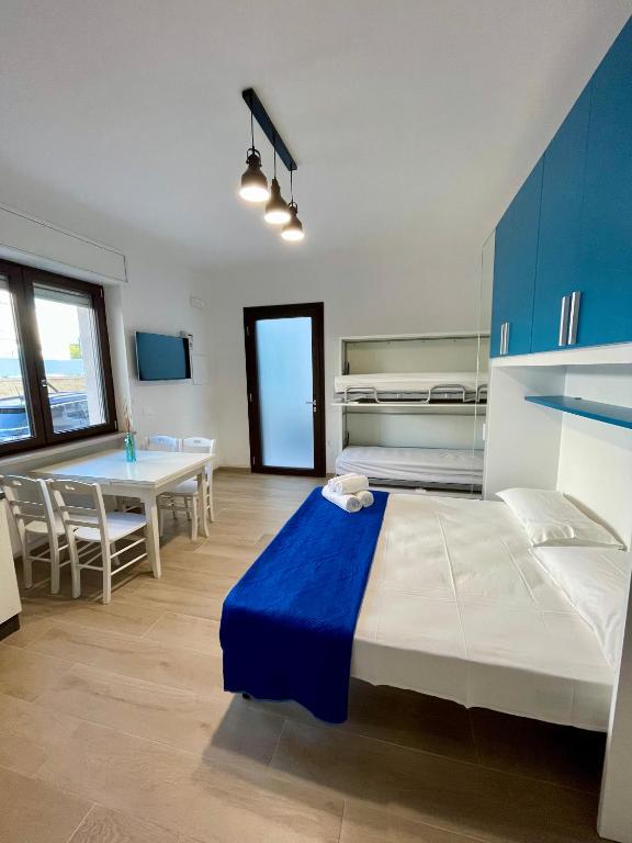 Postel nebo postele na pokoji v ubytování Sant Isidoro Apartments