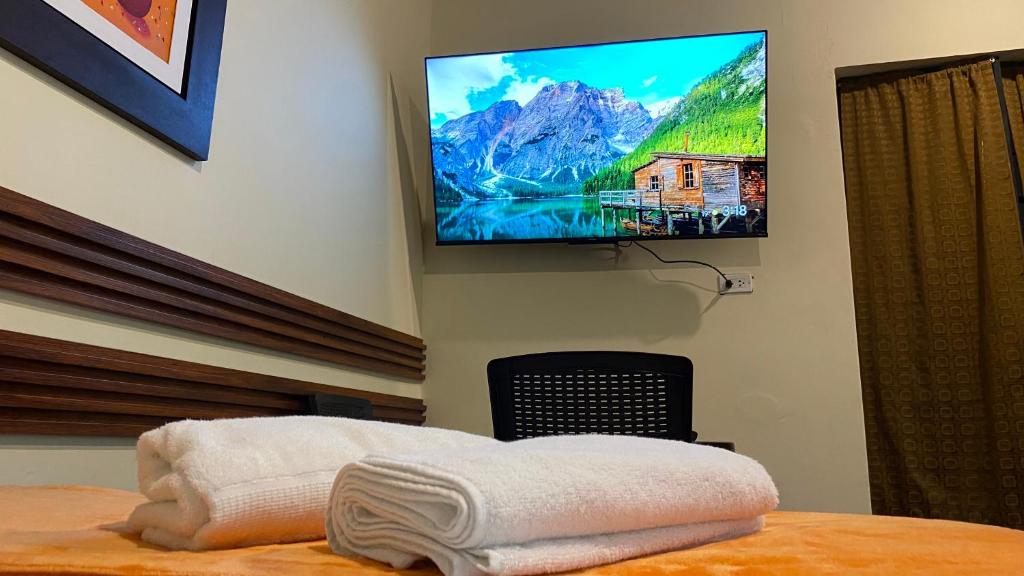 TV a/nebo společenská místnost v ubytování Posada Miraflores
