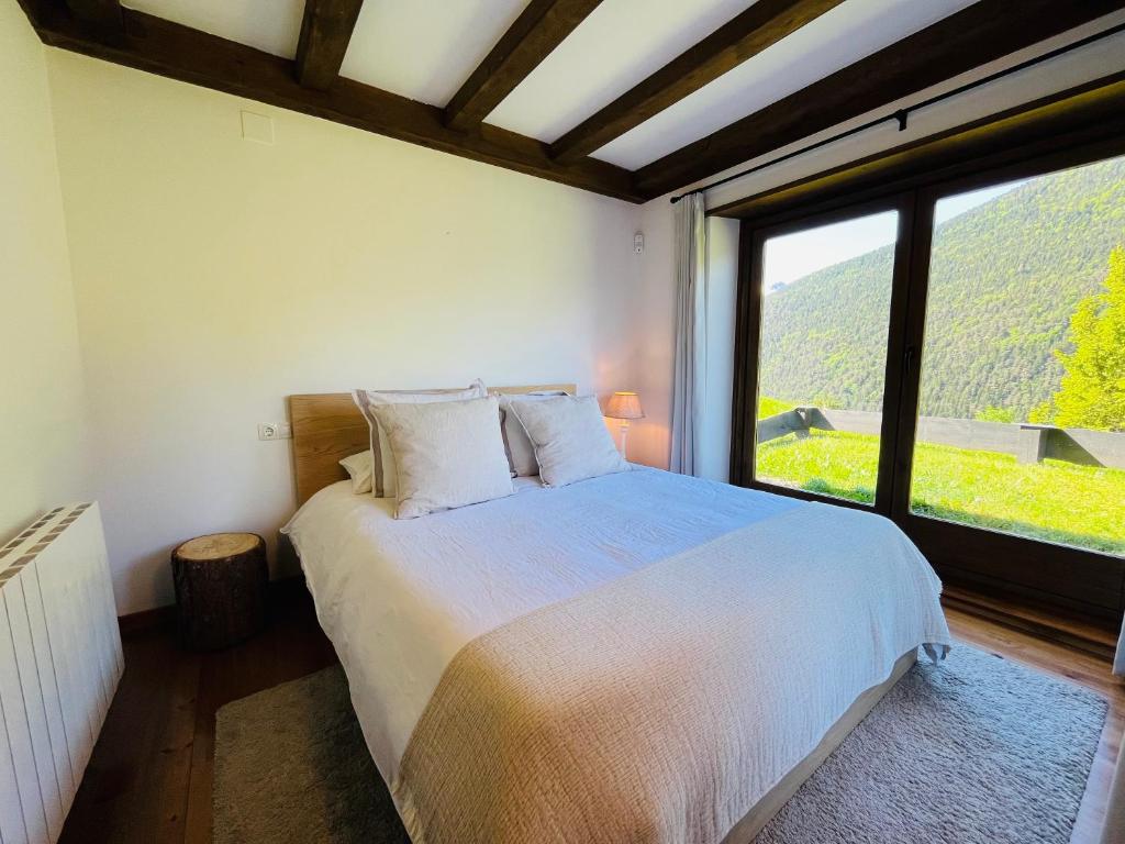 Ένα ή περισσότερα κρεβάτια σε δωμάτιο στο Los Pinos