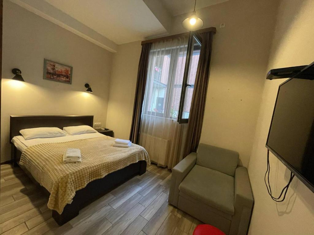 TV a/nebo společenská místnost v ubytování Guest House Lion