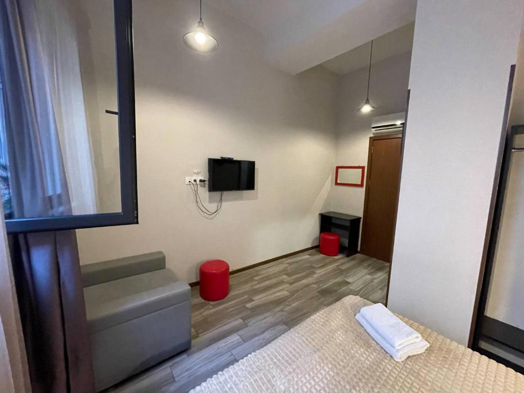 TV a/nebo společenská místnost v ubytování Guest House Lion