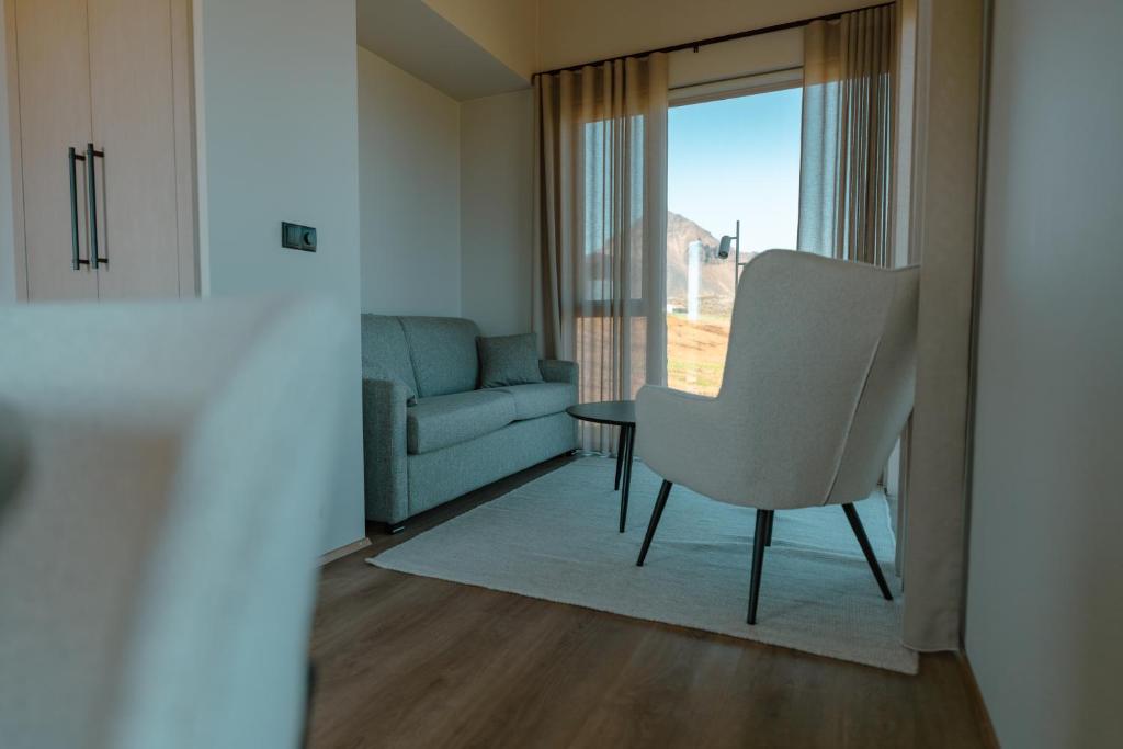 Posezení v ubytování Peninsula Suites