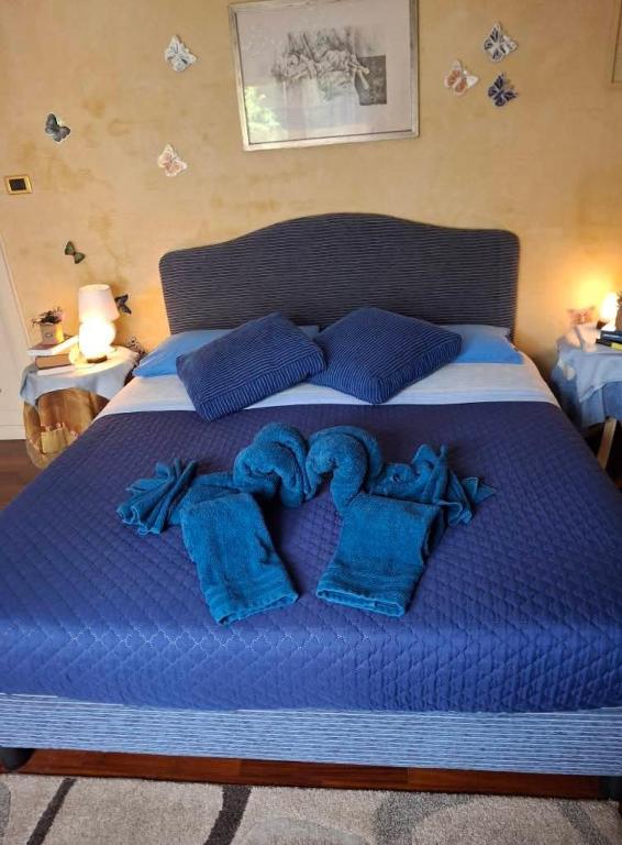 Łóżko lub łóżka w pokoju w obiekcie Sky Room