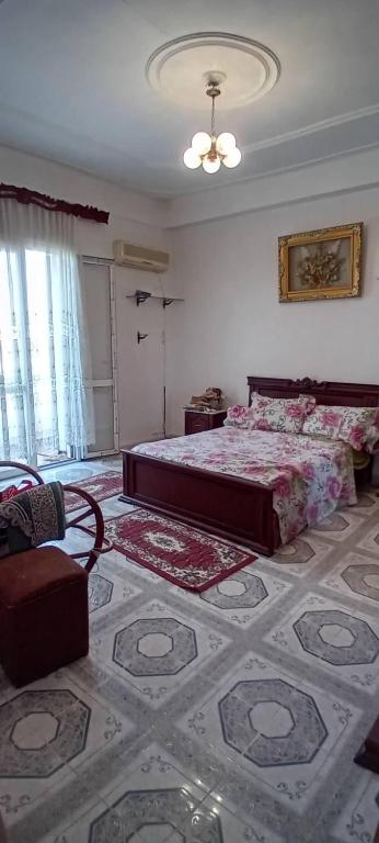 Postel nebo postele na pokoji v ubytování النعيمه هاوس