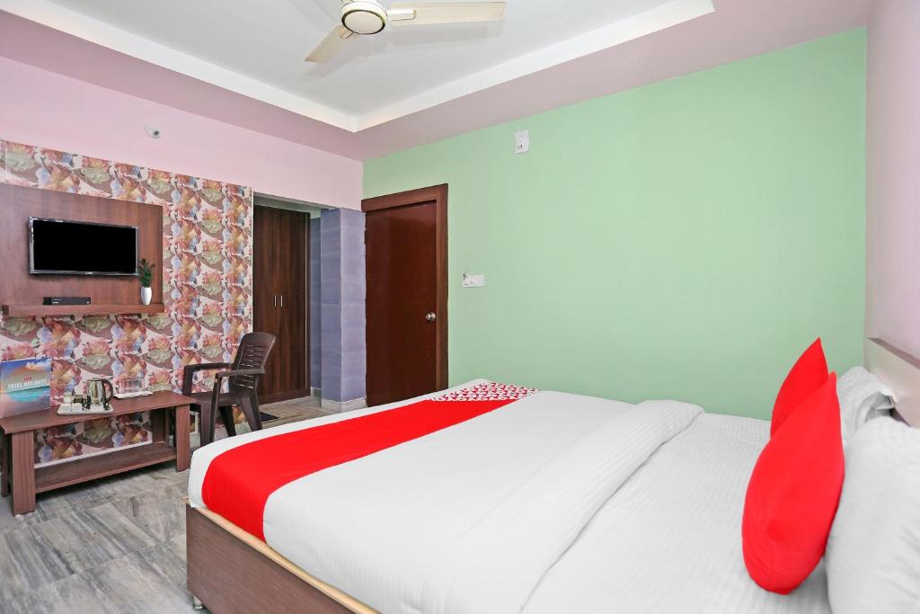 TV a/nebo společenská místnost v ubytování Collection O Aryan hotel