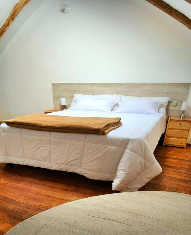 Postel nebo postele na pokoji v ubytování Loft Casa Yucay