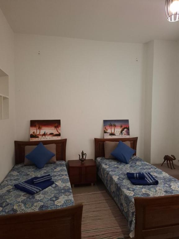 Voodi või voodid majutusasutuse Aziz Medina Hotels toas