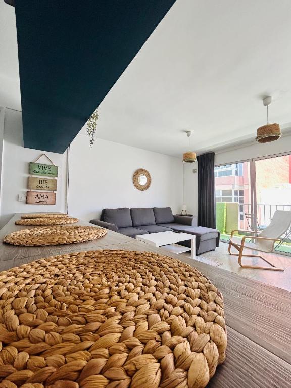 a living room with two beds and a couch at Médano Beach Blue in El Médano