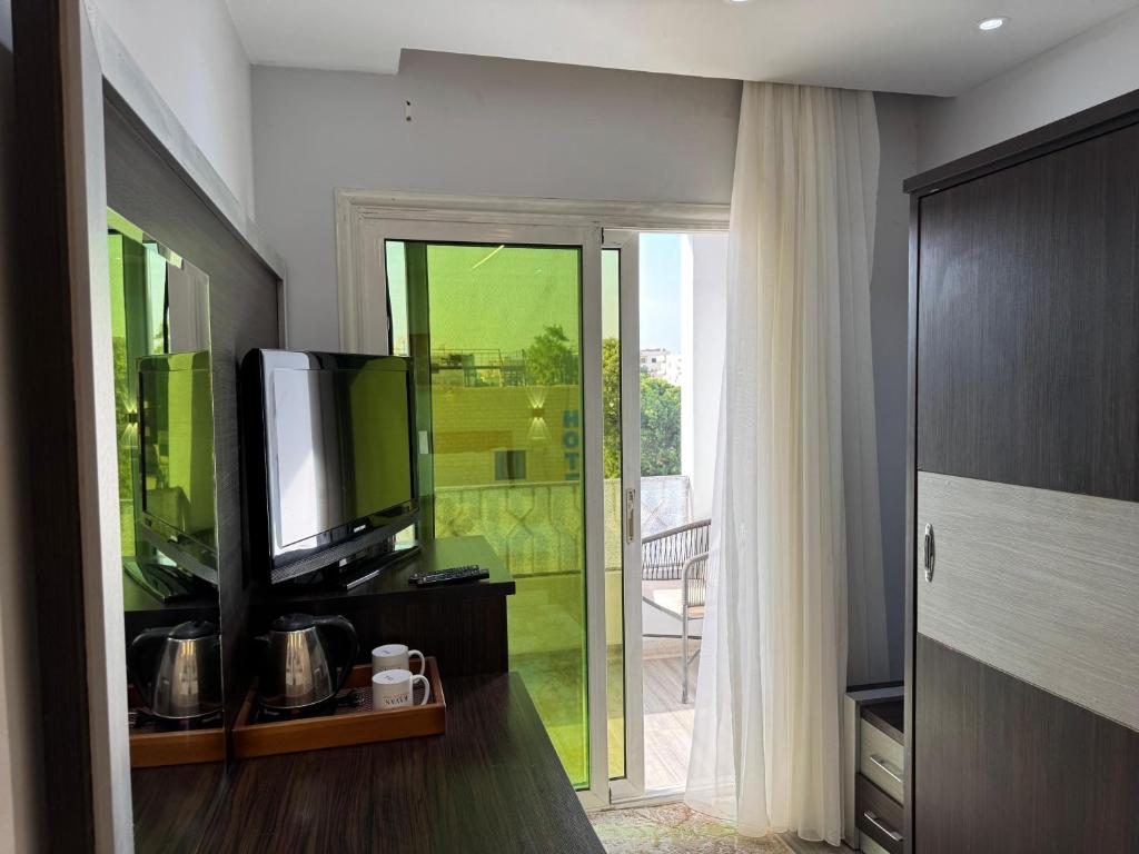 Kuchyň nebo kuchyňský kout v ubytování Kayan Pyramids Hotel