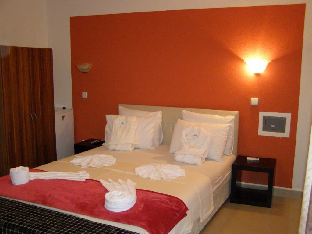Postel nebo postele na pokoji v ubytování Hotel Wellness & Spa Angelo Gabriel