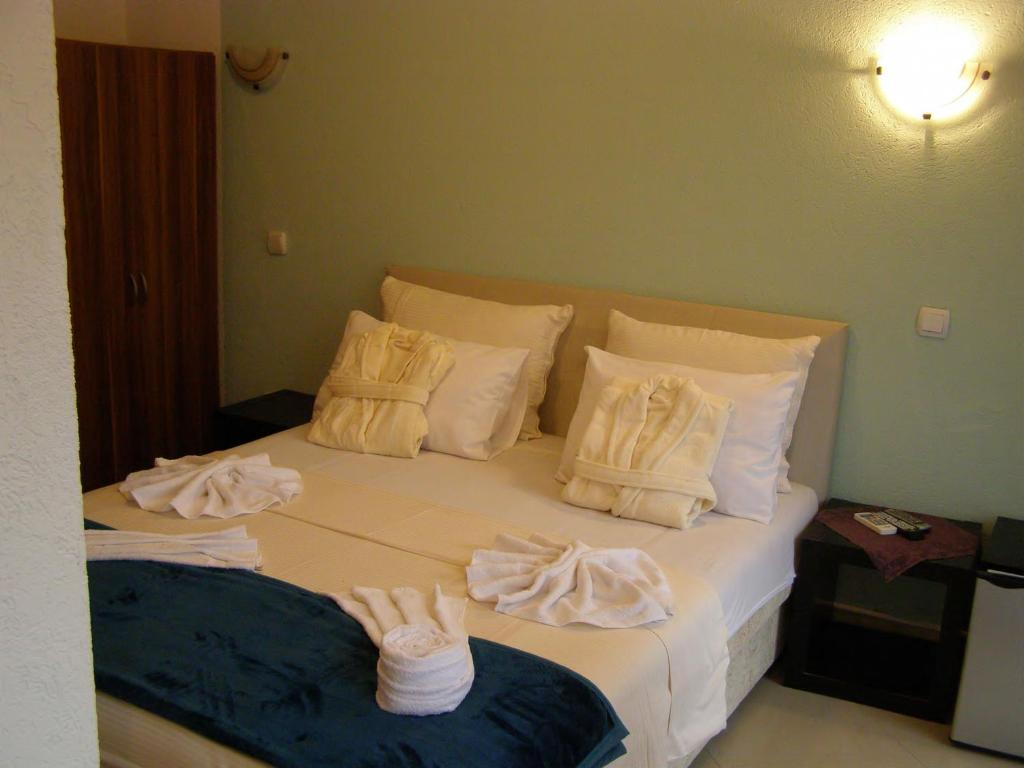 Postel nebo postele na pokoji v ubytování Hotel Wellness & Spa Angelo Gabriel