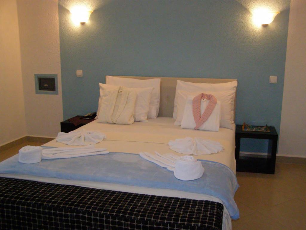 Postel nebo postele na pokoji v ubytování Hotel Wellness & Spa Angelo Gabriel