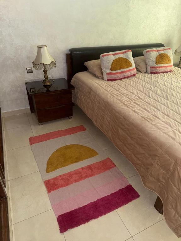 Postel nebo postele na pokoji v ubytování Spacious Appartment in the heart of Tangier with 2 living rooms, 2 bedrooms KING SIZE beds, 2 baths, 2 patios