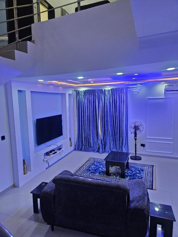 TV a/nebo společenská místnost v ubytování ambiance abodes
