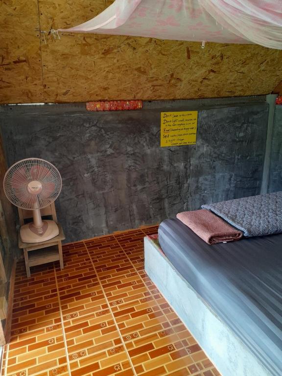 Postel nebo postele na pokoji v ubytování KK Hut