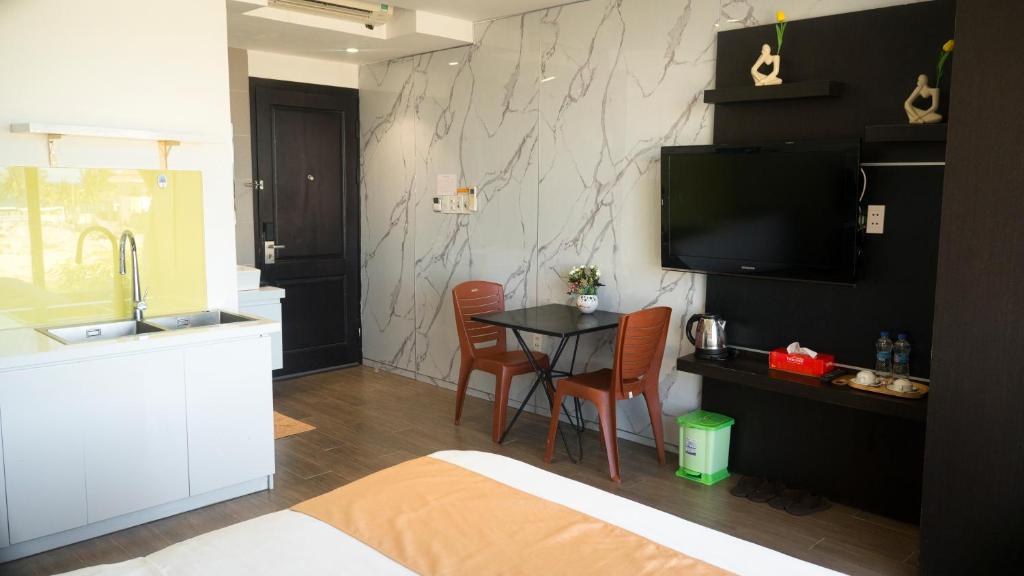 Kuchyň nebo kuchyňský kout v ubytování Horizon Front Beach Hotel Danang