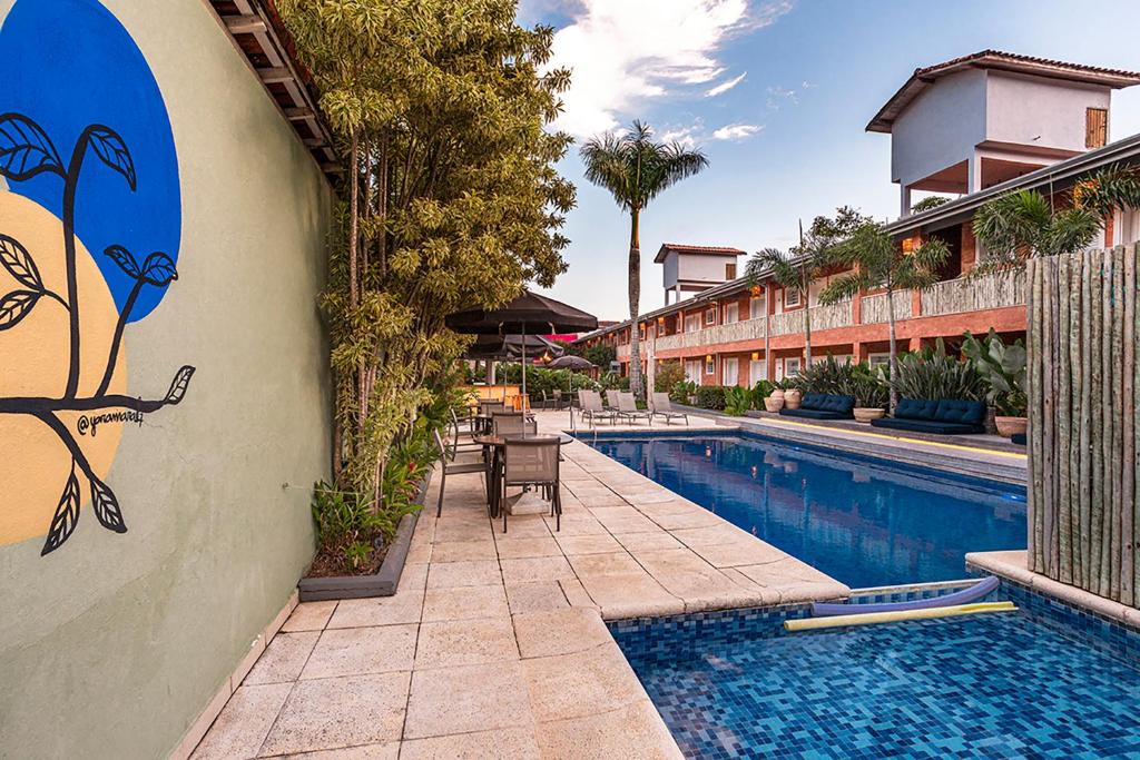 A piscina localizada em Pousada Azul da Cor do Mar ou nos arredores