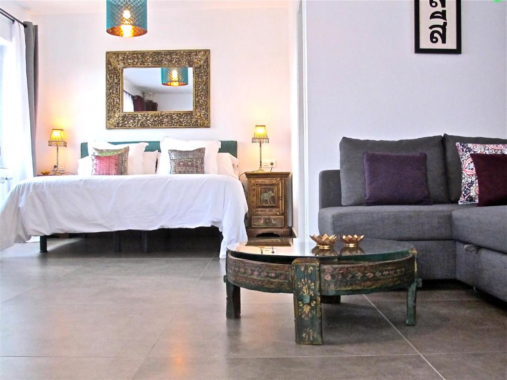A bed or beds in a room at El Sosiego
