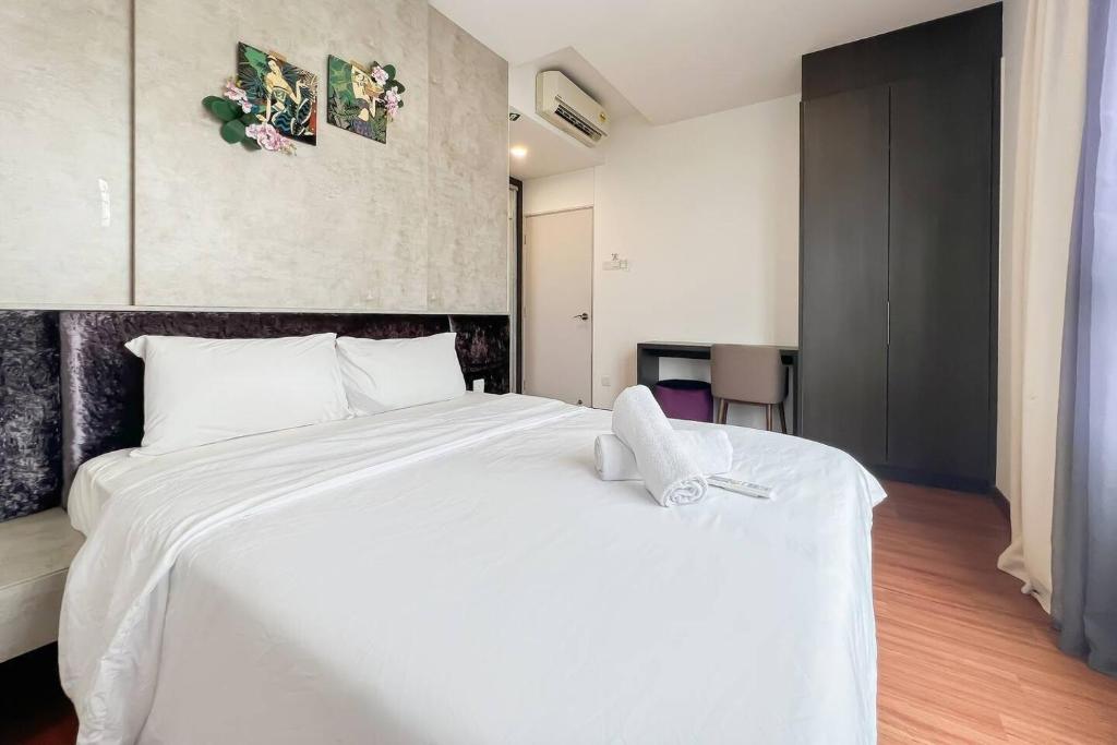 Ένα ή περισσότερα κρεβάτια σε δωμάτιο στο ICity 2Bedroom Lux Apartment