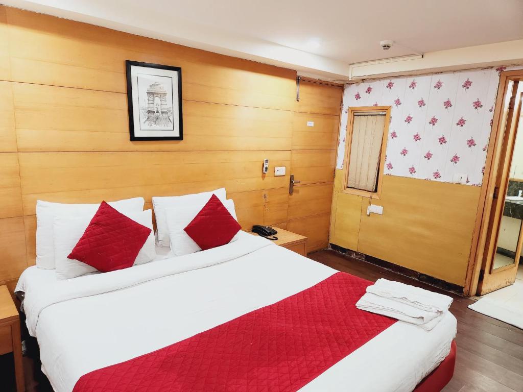 Postel nebo postele na pokoji v ubytování Hotels Daffodils
