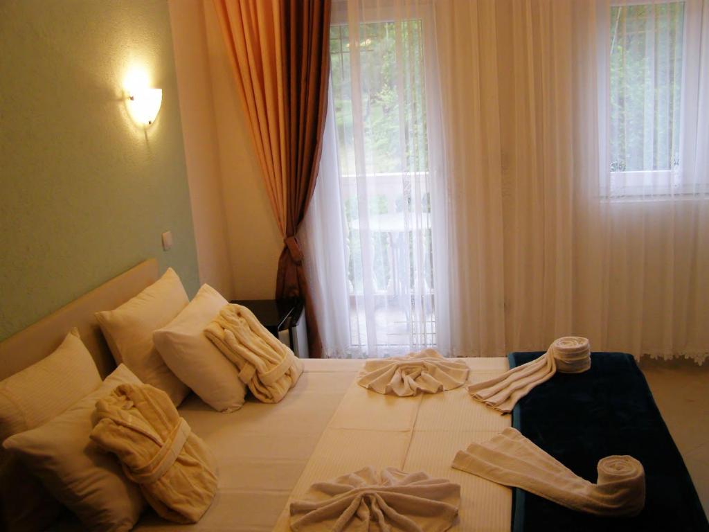 Postel nebo postele na pokoji v ubytování Hotel Wellness & Spa Angelo Gabriel