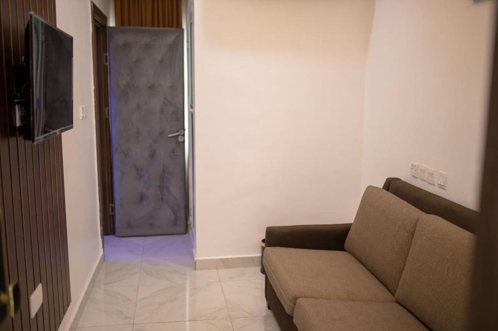TV a/nebo společenská místnost v ubytování Hilton Euphoria Hotel