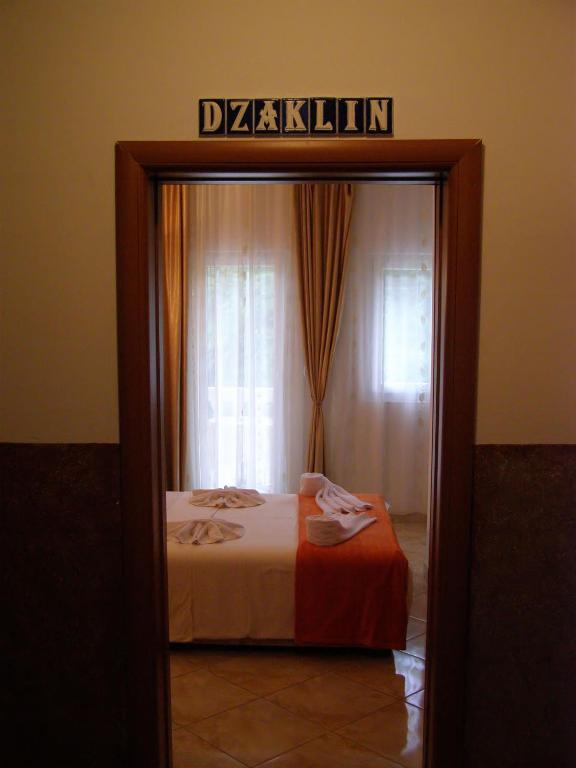 Postel nebo postele na pokoji v ubytování Hotel Wellness & Spa Angelo Gabriel
