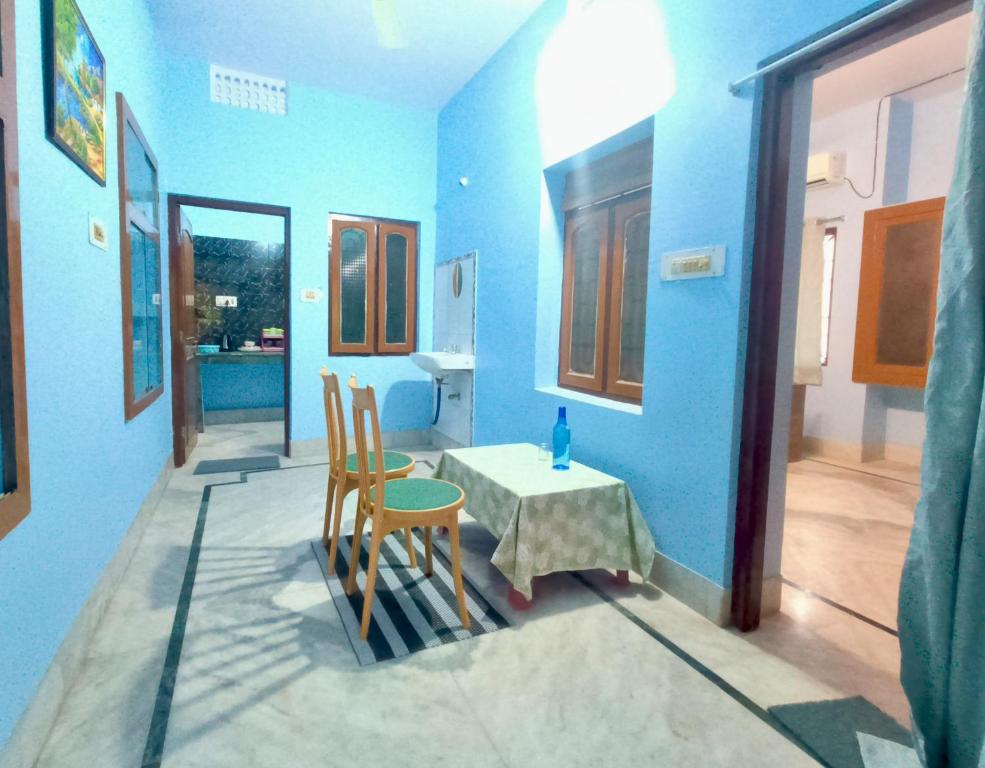 Postel nebo postele na pokoji v ubytování Ratna's Nest Homestay