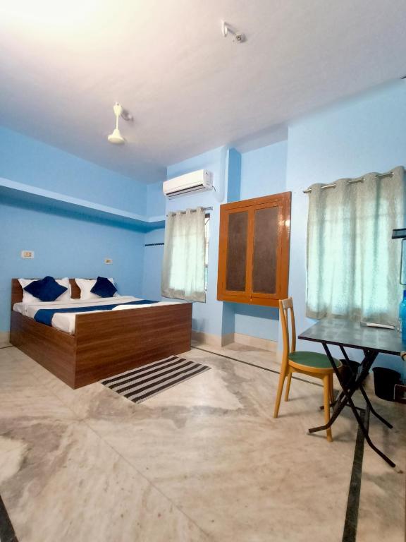 Postel nebo postele na pokoji v ubytování Ratna's Nest Homestay