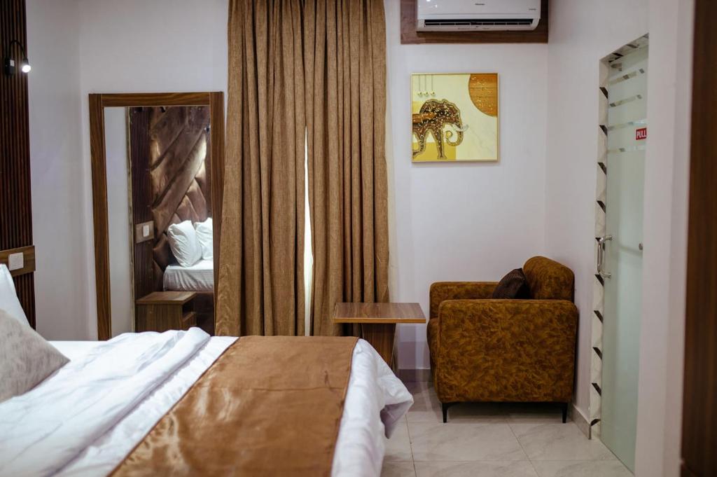 Postel nebo postele na pokoji v ubytování Hilton Euphoria Hotel