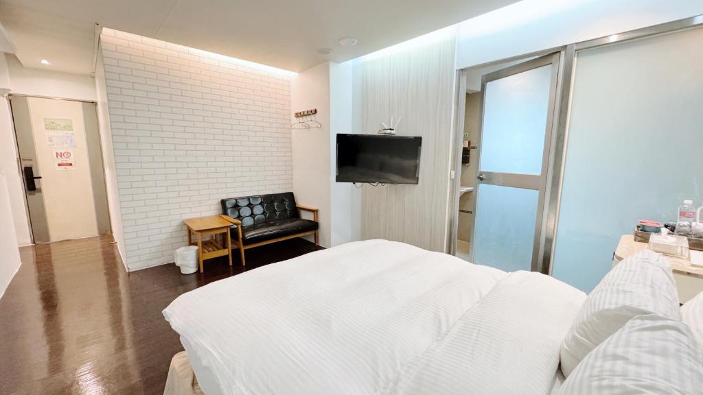 TV a/nebo společenská místnost v ubytování Youai Jiaoxi Hot Spring Hotel