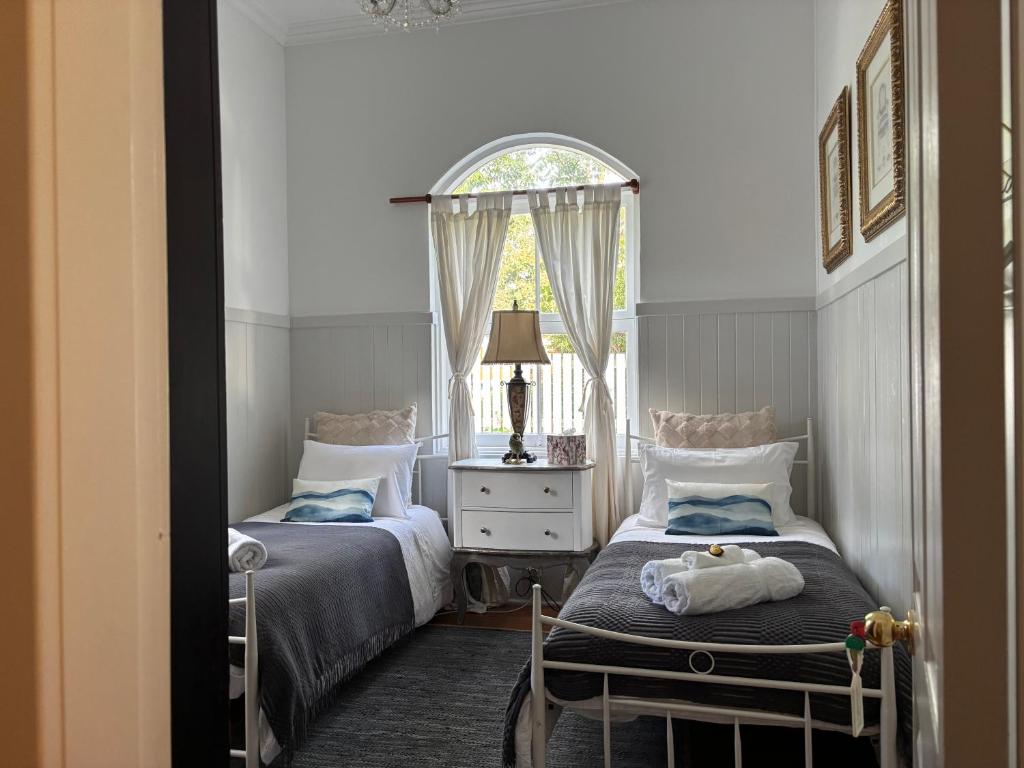 Postel nebo postele na pokoji v ubytování Celestial Dew Guesthouse in Tyalgum