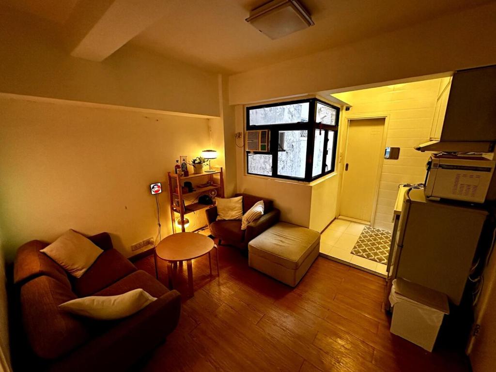 Kuchyň nebo kuchyňský kout v ubytování Cozy flat in Hong Kong