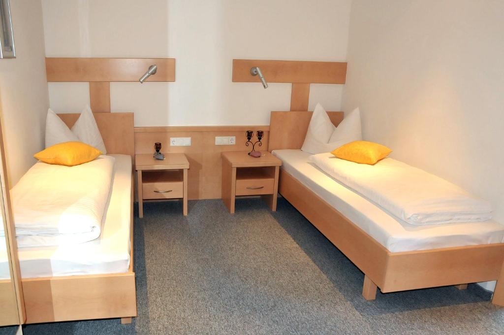 Postel nebo postele na pokoji v ubytování Haus Bstieler
