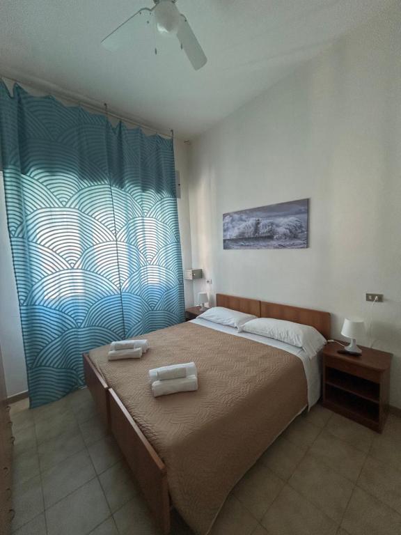 Postel nebo postele na pokoji v ubytování LUDO Holiday House