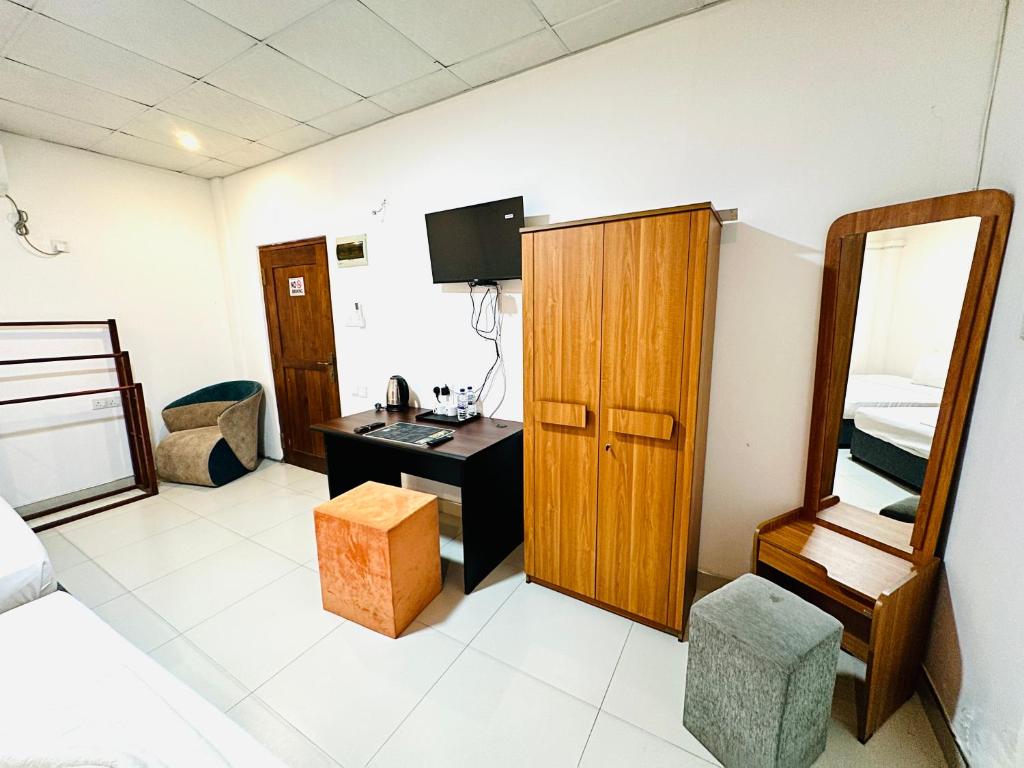 Postel nebo postele na pokoji v ubytování Ismattha Hotel