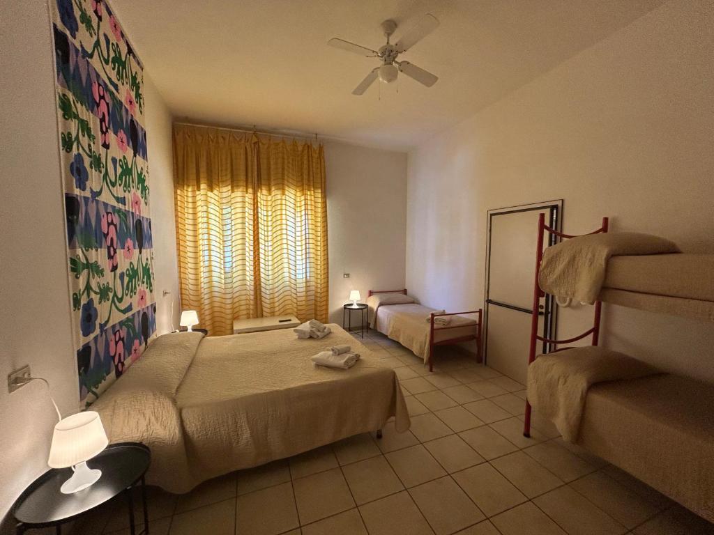 Postel nebo postele na pokoji v ubytování LUDO Holiday House