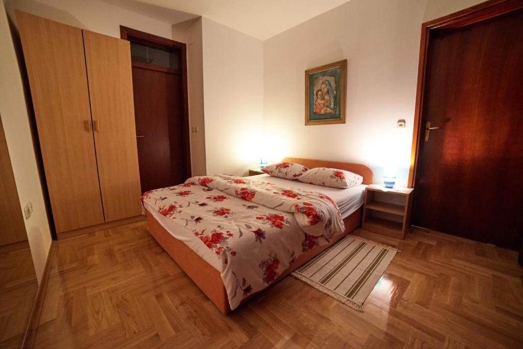 Postel nebo postele na pokoji v ubytování Apartment Đakovo