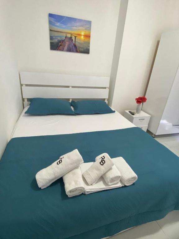 Postel nebo postele na pokoji v ubytování Rai Rooms