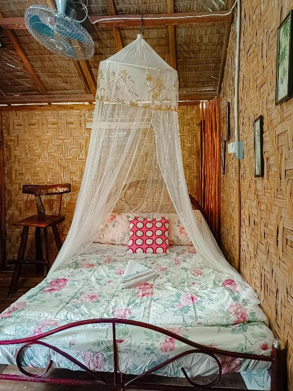Postel nebo postele na pokoji v ubytování A. Zaragosa Lodging House