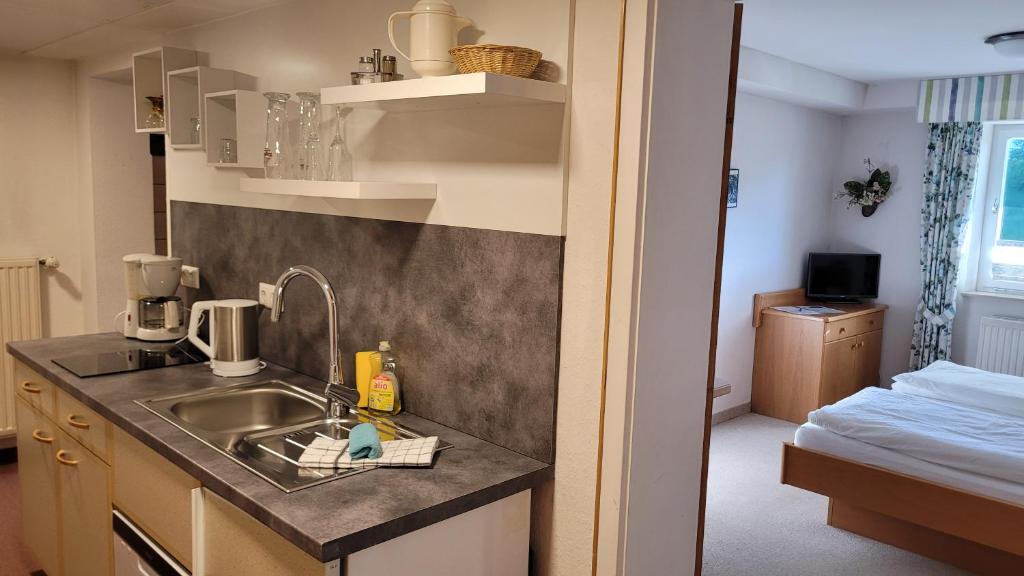 Kuchyň nebo kuchyňský kout v ubytování Haus Kranzusch