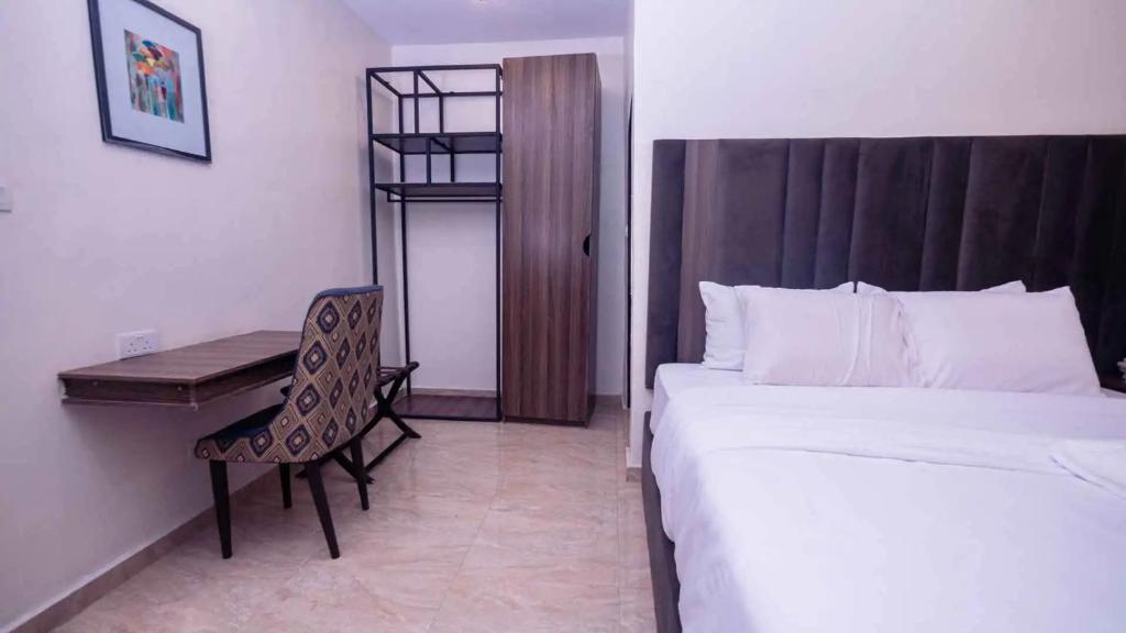 Postel nebo postele na pokoji v ubytování Ibizza Pit Hotel and Suites