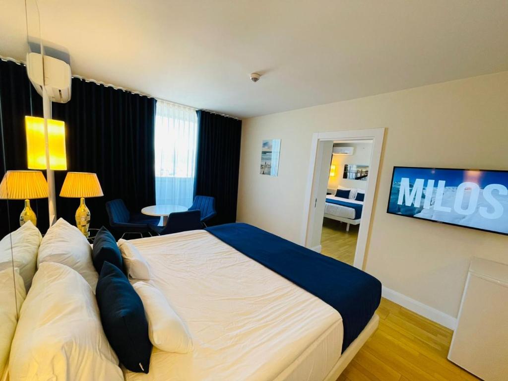 Postel nebo postele na pokoji v ubytování Batumi VIP hotel
