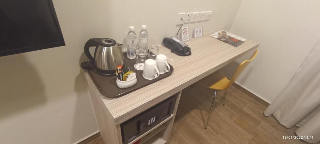 Příslušenství pro přípravu čaje a kávy v ubytování The Klagan Hotel