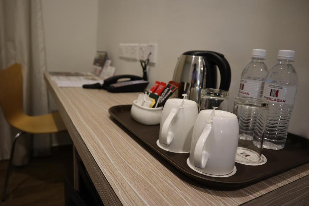 Příslušenství pro přípravu čaje a kávy v ubytování The Klagan Hotel