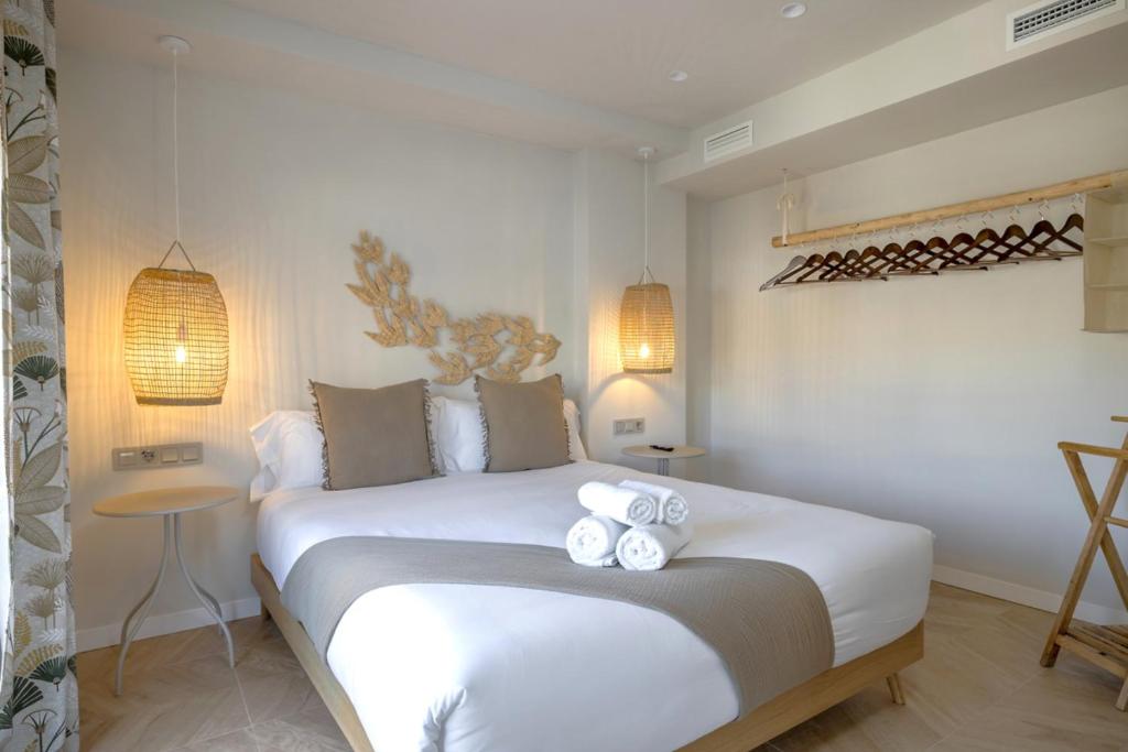 Postel nebo postele na pokoji v ubytování Montroig 5 hotel boutique