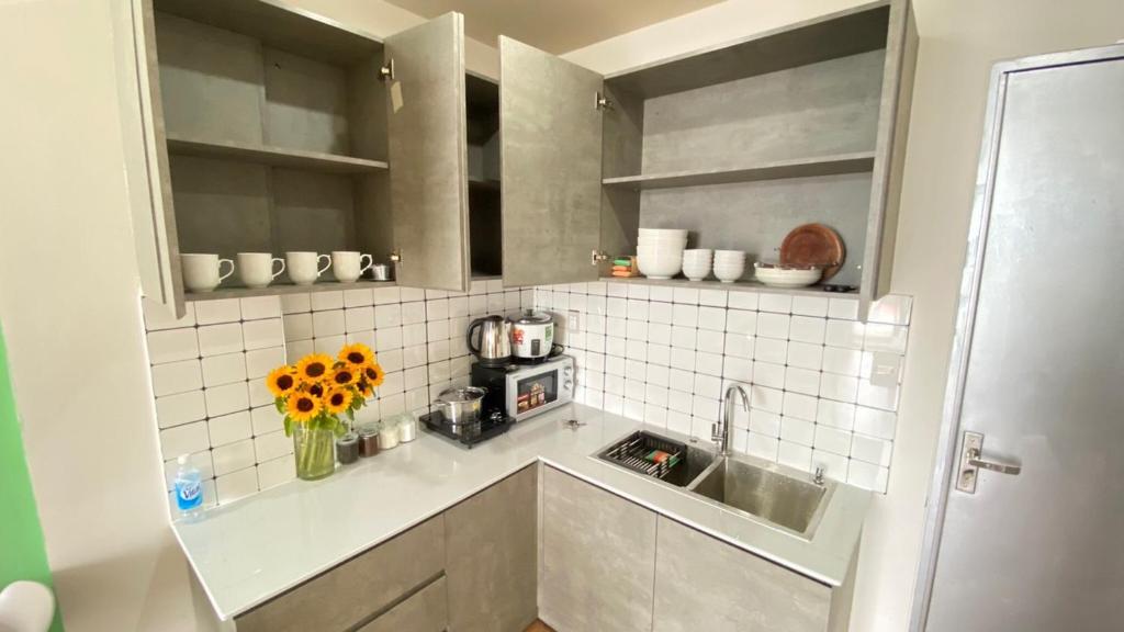 Η κουζίνα ή μικρή κουζίνα στο Colline' House In Phan Rang