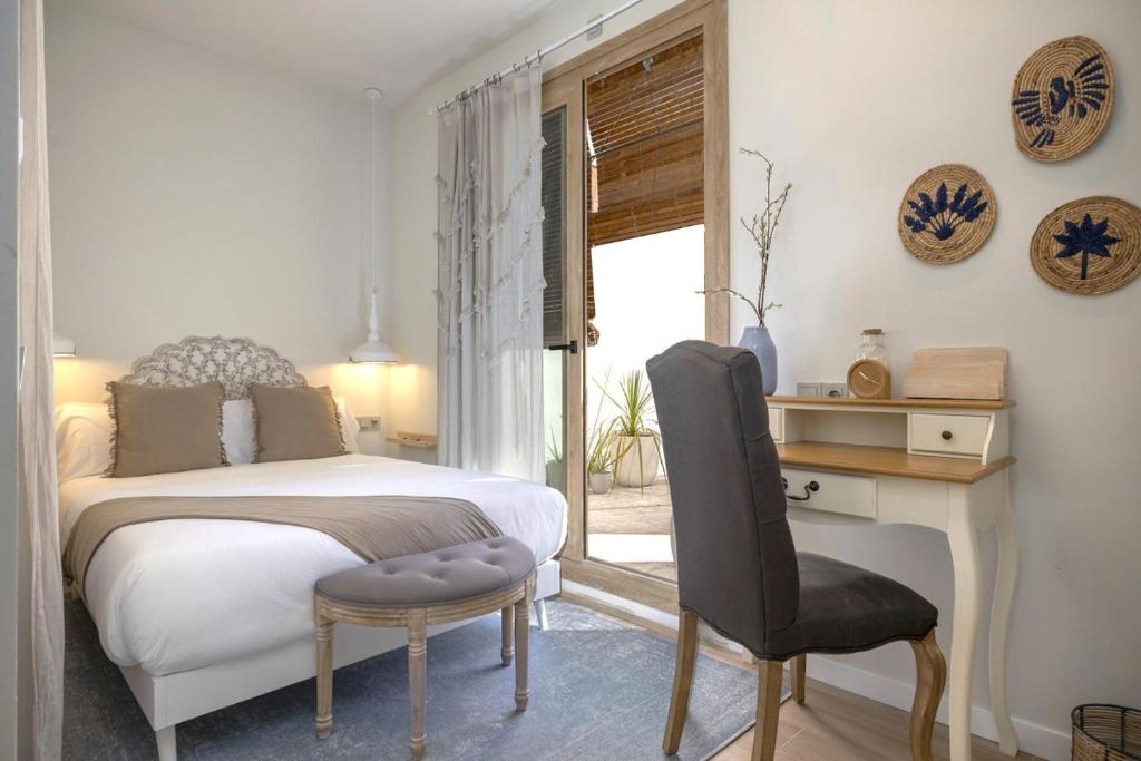 Postel nebo postele na pokoji v ubytování Montroig 5 hotel boutique