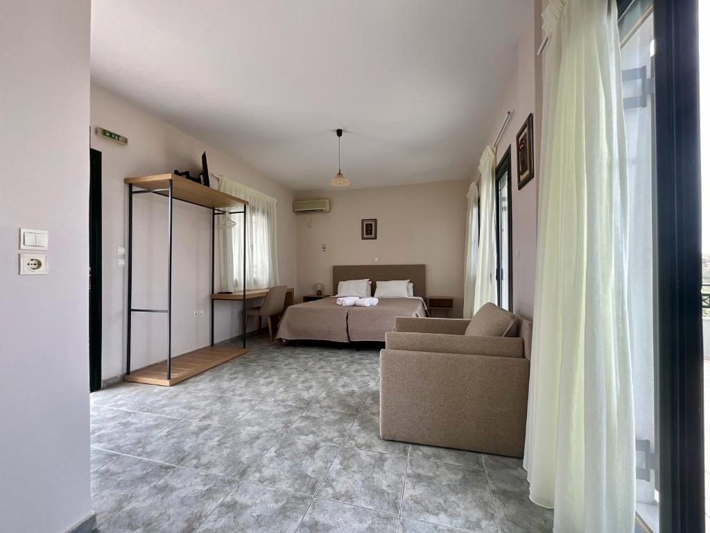 A bed or beds in a room at Niforos Panorama